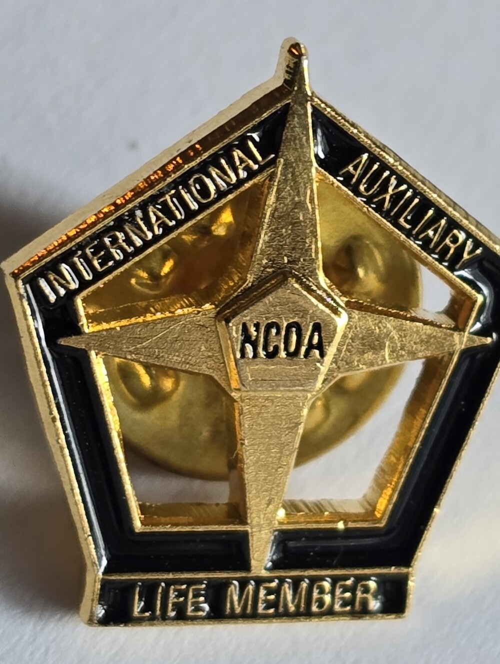 NCOA International Auxiliary Life Member pin military lapel gold tone